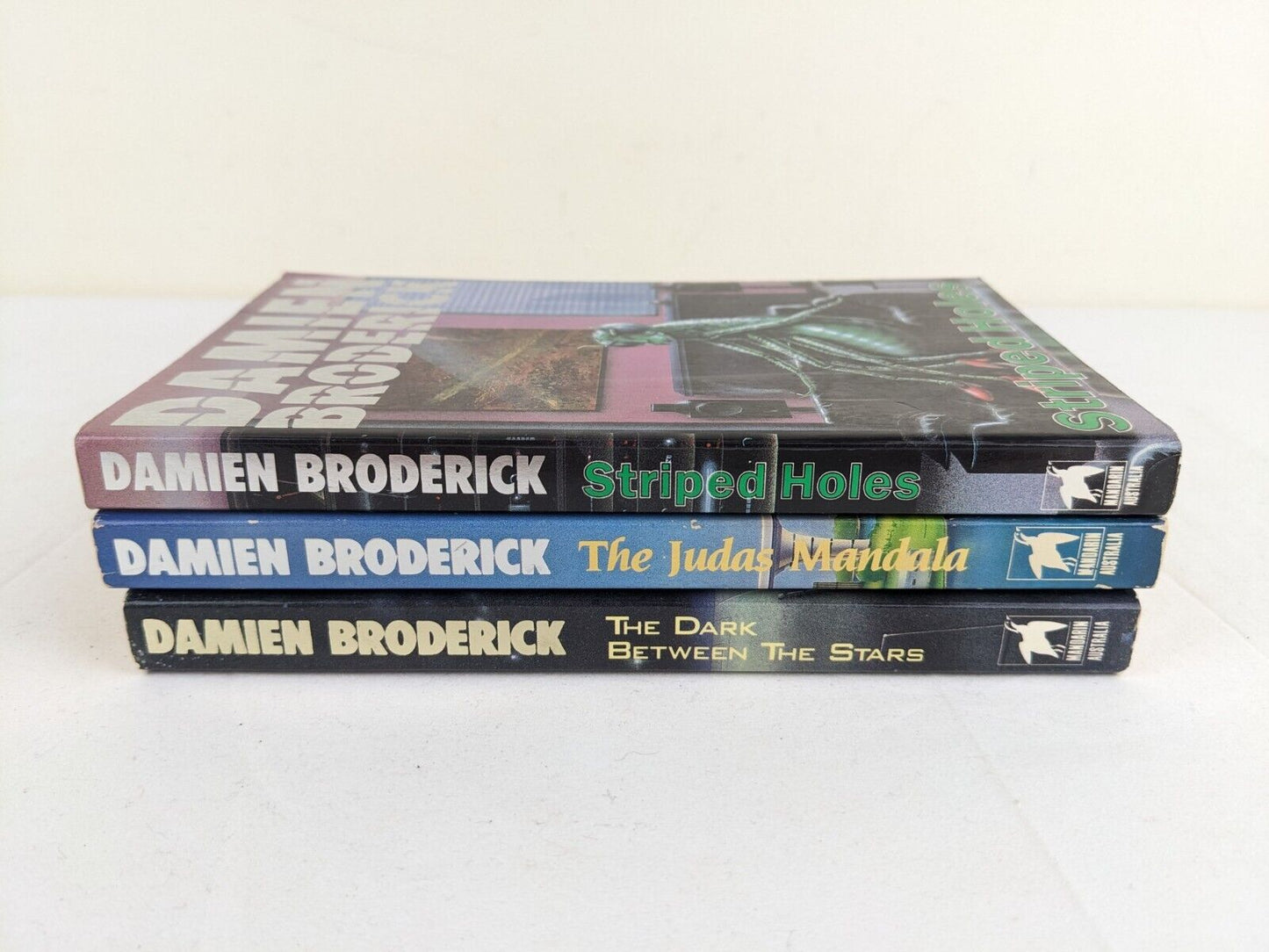 Damien Broderick x 3 - Striped Holes, Judas Mandala, Dark between stars 1988