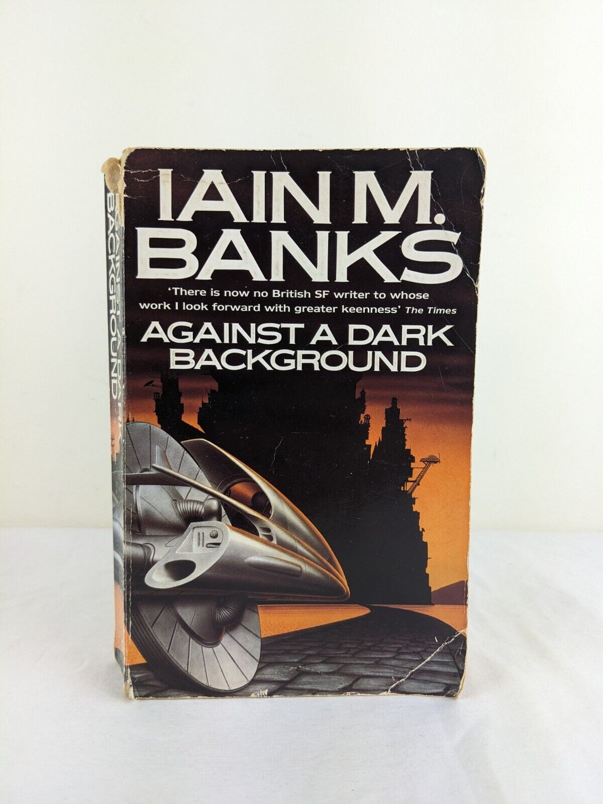 Against a dark background by Iain M. Banks 1998