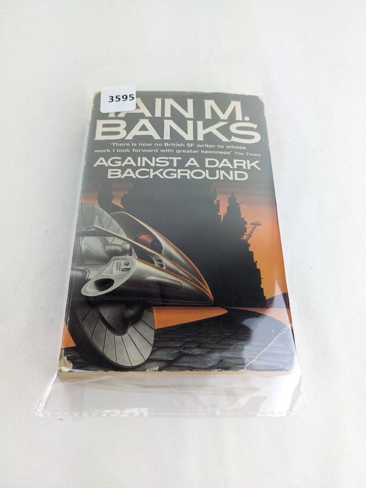 Against a dark background by Iain M. Banks 1998