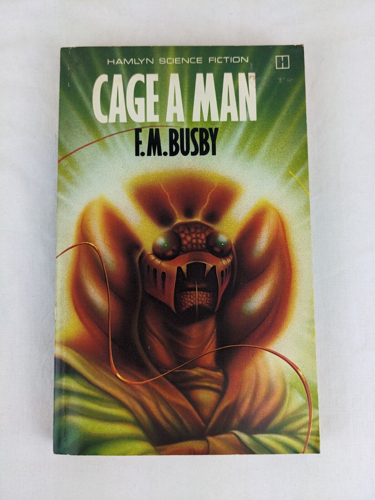 Cage a man by F.M. Busby 1979 Demu trilogy