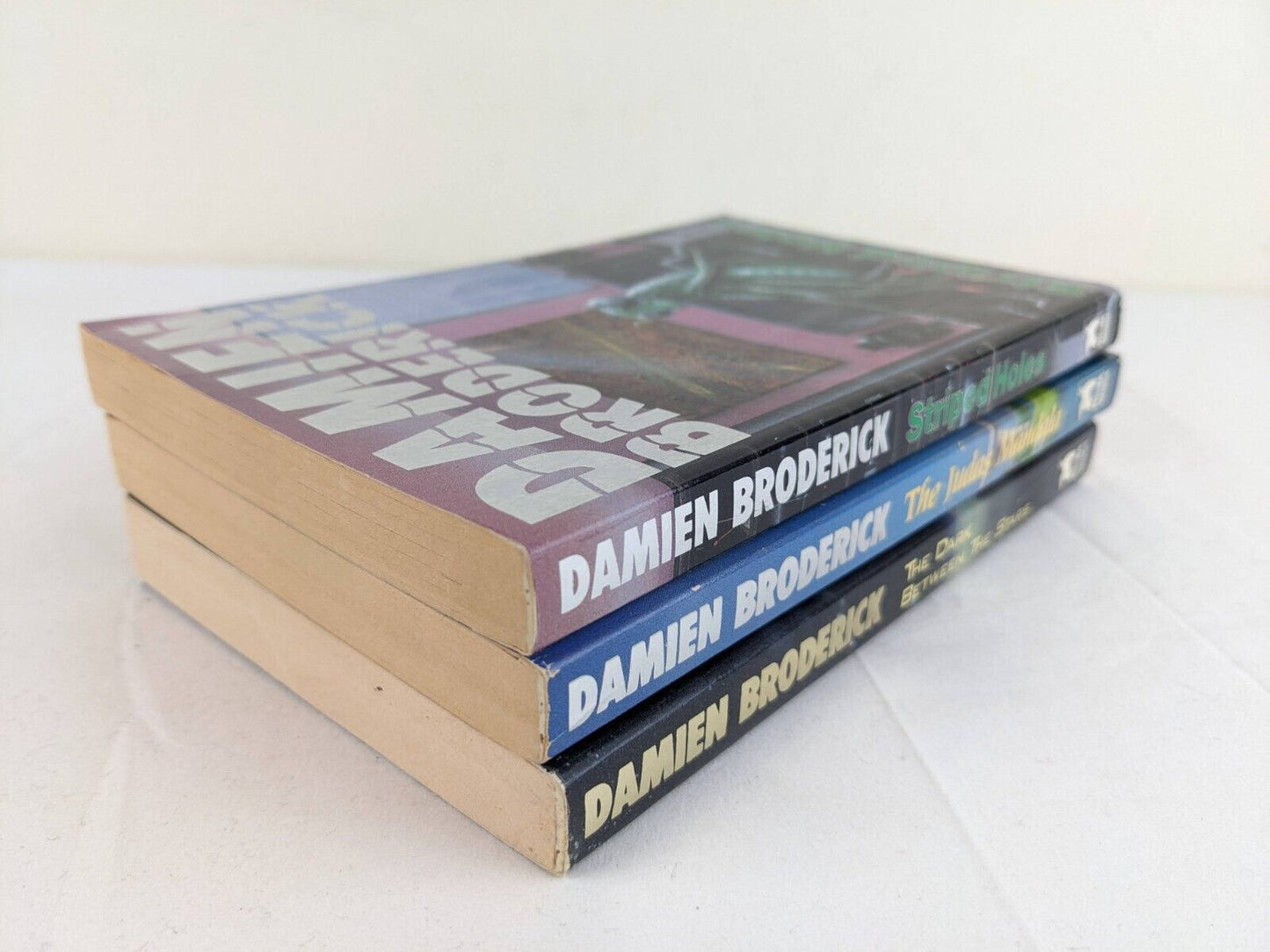 Damien Broderick x 3 - Striped Holes, Judas Mandala, Dark between stars 1988