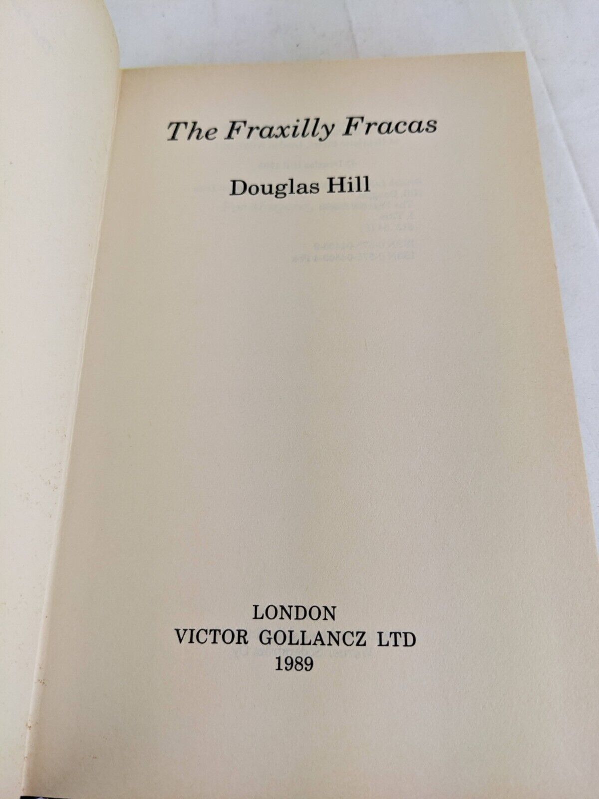 The fraxilly fracas by Douglas Hill Hardcover 1989