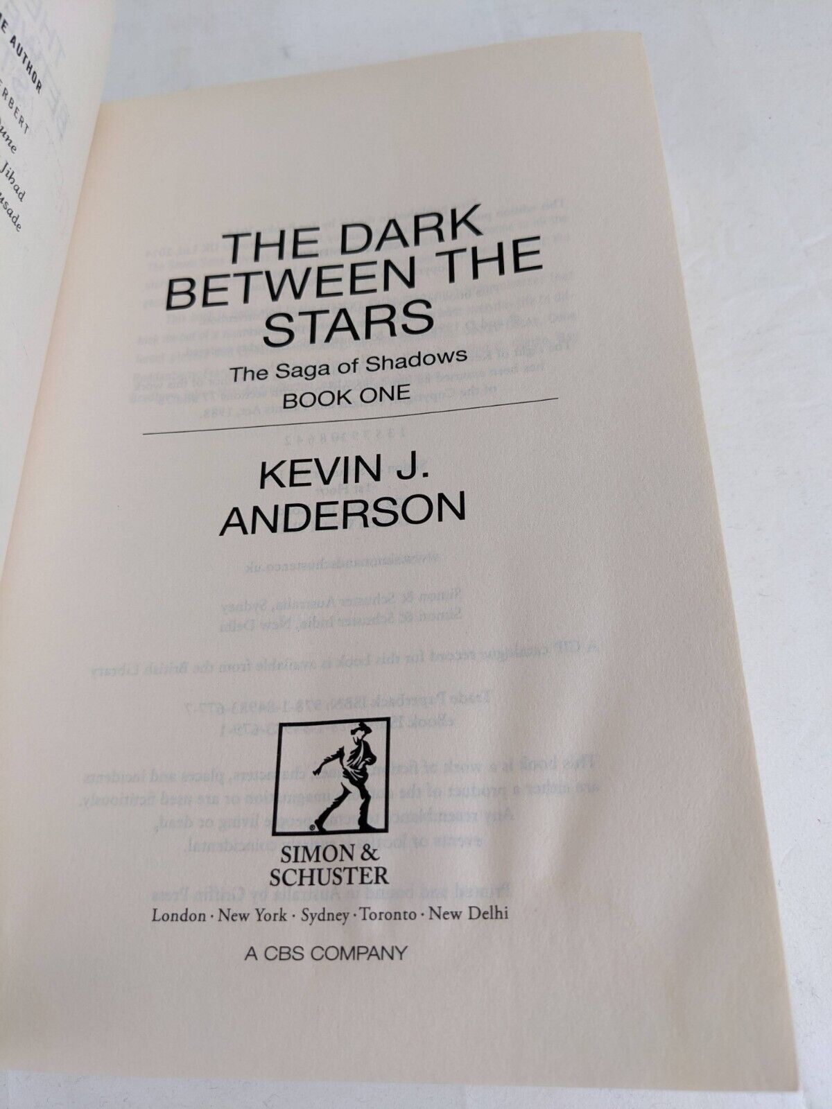 The dark between the stars by Kevin J. Anderson 2014 Saga of shadows